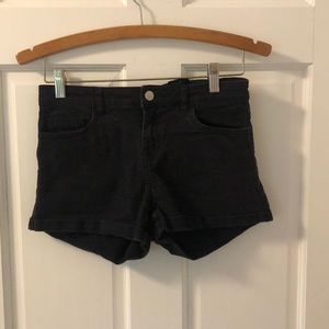 H&M black shorts.